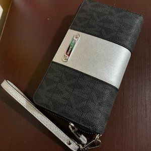 Michael Kors black and silver wristlet / wallet